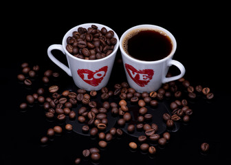 cup of coffee with beans on black background