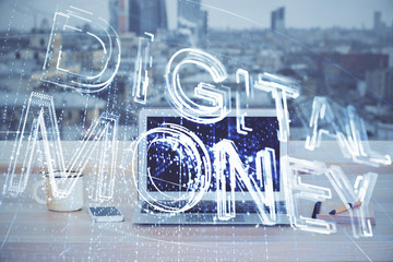 Double exposure of blockchain and crypto economy theme hologram and table with computer background....