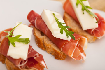 perfect sandwich made with rye bread cheese and Parma ham