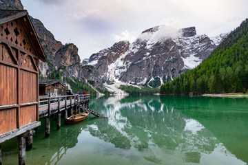 Fototapeta premium Breathtaking view of Braies lake in Dolomites, Italy. A turquoise lake with background of mountains of alps.