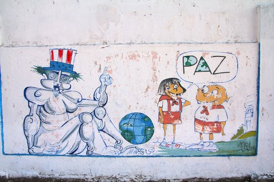 SANTA CLARA, CUBA - FEBRUARY 22, 2011: Wall mural with anti-American propaganda in Santa Clara, Cuba. Anti-American attitude is promoted by national government.