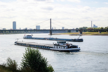 Obraz premium Cargo ship. International logistics. Delivery of goods. Dusseldorf. Germany