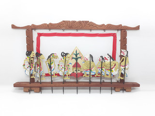 Indonesian Traditional Ethnic Artistic Vintage Handmade Leather Shadow Puppet in White Isolated...