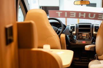 House on wheels. Caravan. Details. Kitchen and utensils. Bedroom and beds. Driver's seat.Campervan.Camper inside