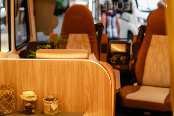 House on wheels. Caravan. Details. Kitchen and utensils. Bedroom and beds. Driver's seat.Campervan.Camper inside
