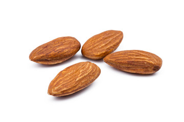 Roasted almonds on white background isolated