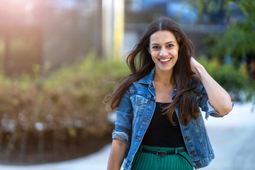 Portrait of young woman in urban area 