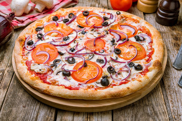 Pizza with vegetables vegetarian on wooden table