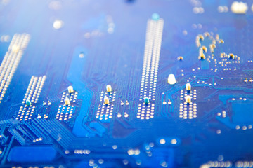 blue computer motherboard close up Electronic with microchips and transistors