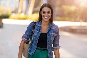 Portrait of young woman in urban area 