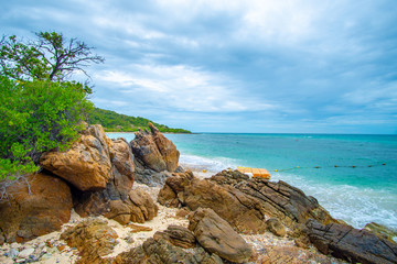 Scenery of natural with clear sea water, beautiful rock and white sand around Ko kham underwater park in Sattahip,Pattaya,Chonburi,Thailand. Tourists attractions in Pattaya.