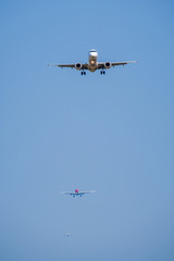 Passenger airplane in the blue sky