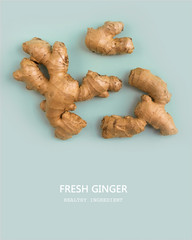 Fresh ginger on blue background. Minimalistic flat lay banner. Healthy organic food.