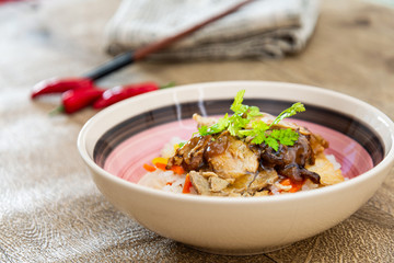Asian style caramel pork with rice and vegetable