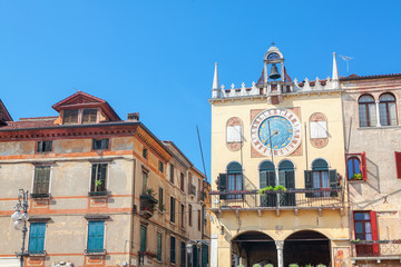 horology on the wall in old town
