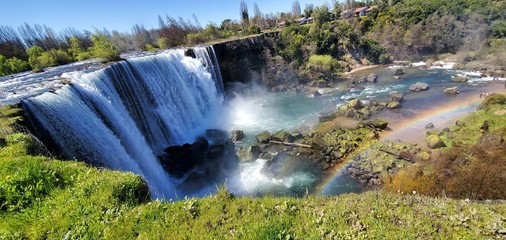 Waterfall Salto del Laja with formation of a beautiful rainbow located in Los Angeles Region Bio Bio South of Chile