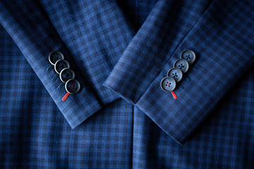 Top view of the Blue suit with sleeves with buttons. Bird eye view of the Long sleeved blue suit.