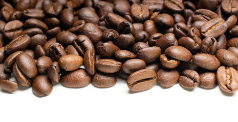 Roasted coffee beans on white