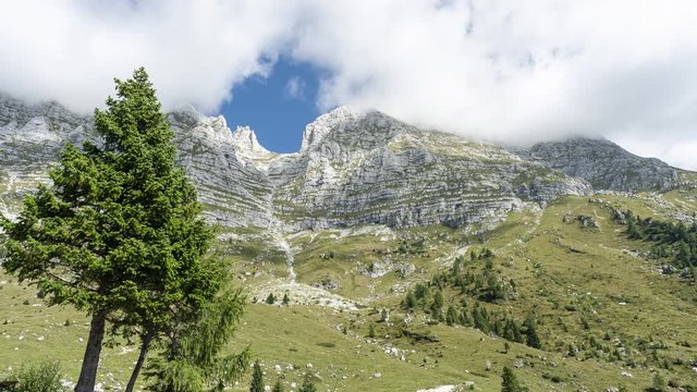 Time lapse footage of the mountain range above Montasio plateau; Julian Alps in Friuli region.