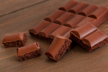 Sweet life. Porous chocolate isolated on table close-up