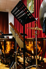 Tripods to hold percussion musical instruments.