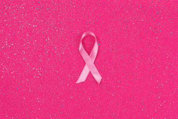 Pink satin ribbon breast cancer awareness month.