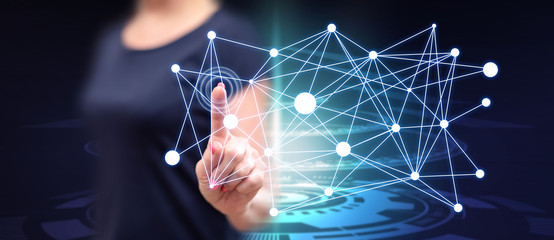 Woman touching a virtual network