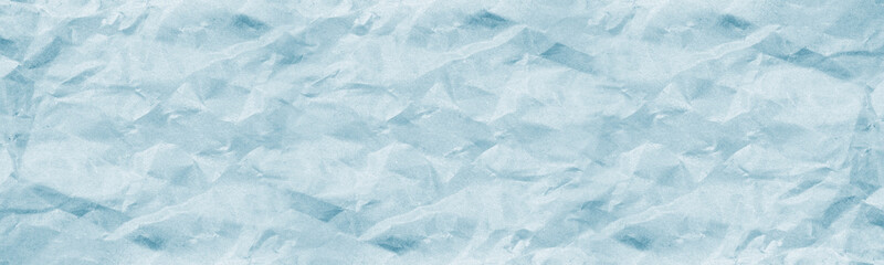 Texture crease of blue paper for template wallpaper. wrinkle of blue paper crumpled background.