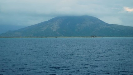 Mountain top in the cloud. Beautiful view of the greek island with rock in the Ionian sea. Nature of Greece. 4K