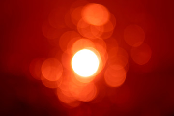 Circle light on light red background.
