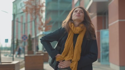 Close up young woman stand with stomach ache sneezing feel sick at outdoor fever cold allergy city beautiful disease female nose lady runny tissue air pollution adult illness district slow motion