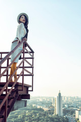 Stylish young girl in an autumn look