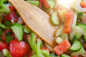 Salad of juicy fresh vegetables close-up. A wholesome snack.