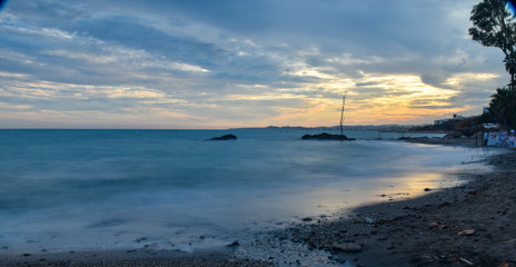 Sunset on the beach in Toreqebrada, Andalucia, Spain