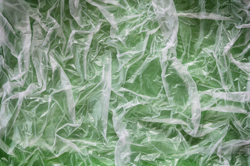 Clear plastic bag texture background. Waste recycling concept. Crumpled polyethylene and cellophane. 