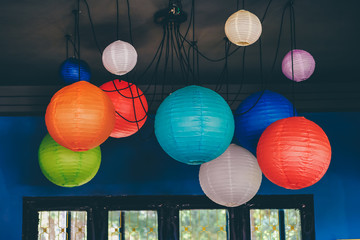 Lanterns at a coffee shop in Da Lat, Vietnam. Royalty high-quality stock photo image of much colorful lantern for decoration in coffee shop.