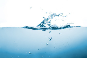 Water splash or water wave with bubbles of air on the background.