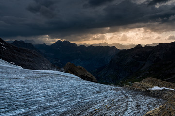glaciertongue of Blümlisalpgletscher at Blüemlisalphütte SAC in dramatic afternoon light