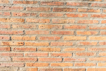 The orange antique vintage old brick texture