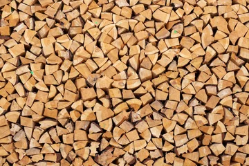 Fotobehang Brandhout textuur stapel hout achtergrondstructuur