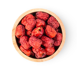 Jujube in wood bowl isolated on white background