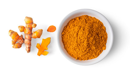 Turmeric powder in ceramic bowl  isolated on white background. top view