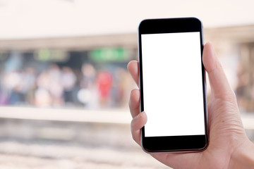 Close up Woman holding blank screen mock up mobile phone.