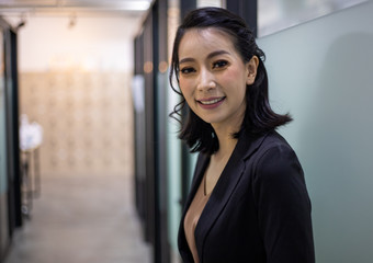 Beautiful business woman smile portrait and stading in the offices.