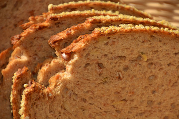 close-up of sliced emmer bread as a healthy and environmentally conscious backdrop, slices of emmer wheat loaf in breakfast basket