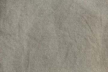 Fototapeta na wymiar Wrinkled gray textile background and texture