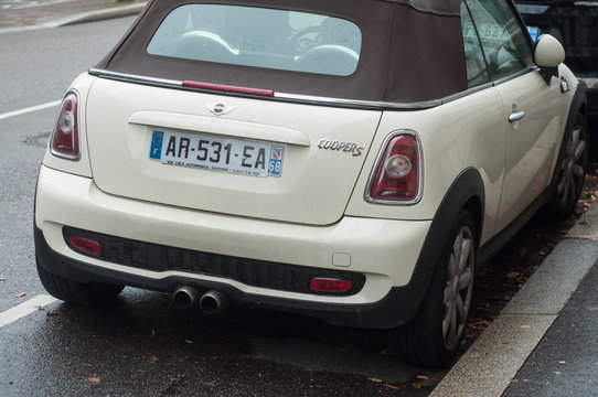 Mulhouse - France - 26 September 2019 - rear view of beige Mini Cooper S  convertible parked in the street Stock Photo | Adobe Stock