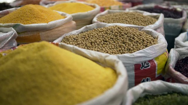 Pan Right to Left Slow: Sacks with Beans and Grains Ready to Be Sold in the Market - Erlian, Mongolia