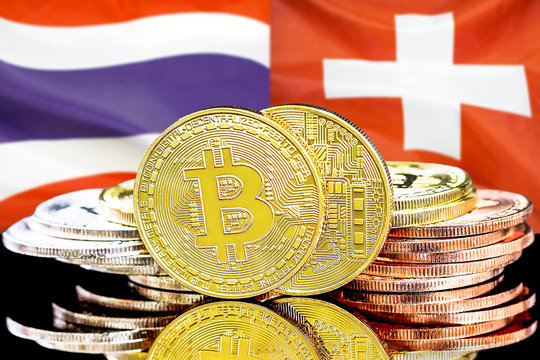 Bitcoins on Thailand and Switzerland flag background