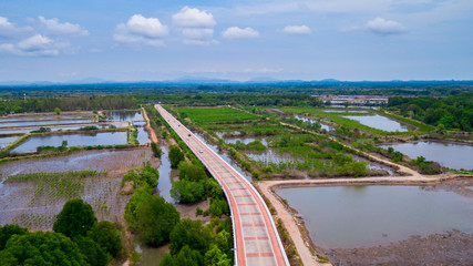 View of Pak Nam Prasae in Rayong province, Thailand. This area have many fisher village along the river.